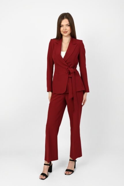 Premium women’s wrap blazer suit with side tie belt and covered buttons, side view