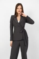 Premium women’s blazer suit with elegant wrap design and covered couture buttons