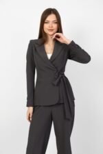 Premium women’s blazer suit with elegant wrap design and covered couture buttons
